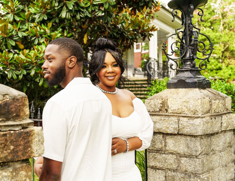 Elegant couple in a beautiful garden setting