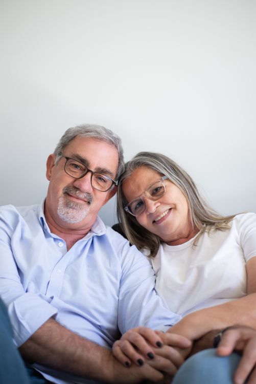 Happy older couple feeling confident about their family's future