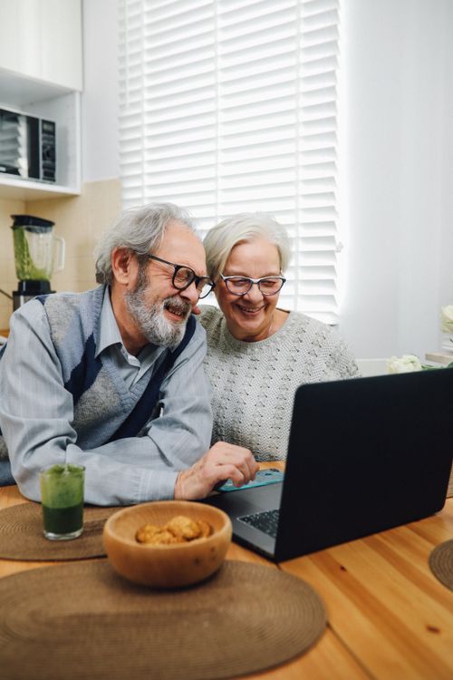 Senior couple working together on their succession plan