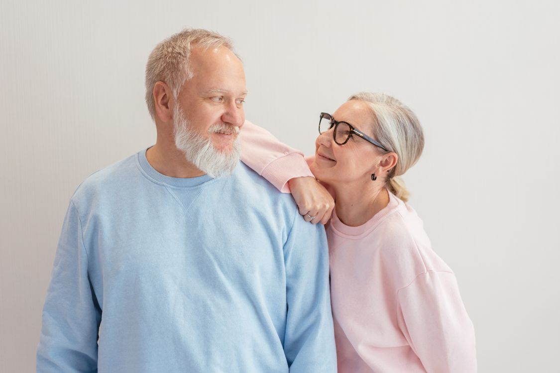 Couple thoughtfully considering their succession planning options