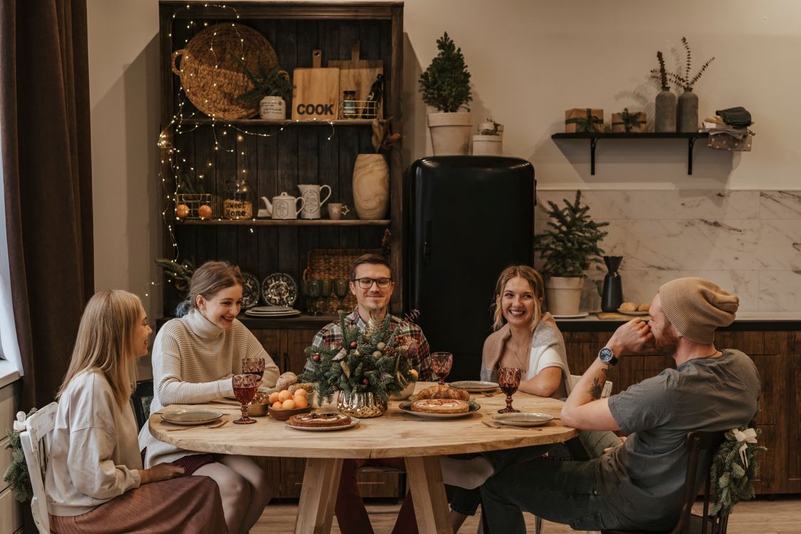 Family gathered around the dining table having an important conversation